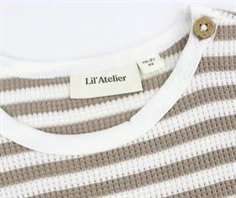 Lil Atelier mocha meringue/coconut milk stribet top